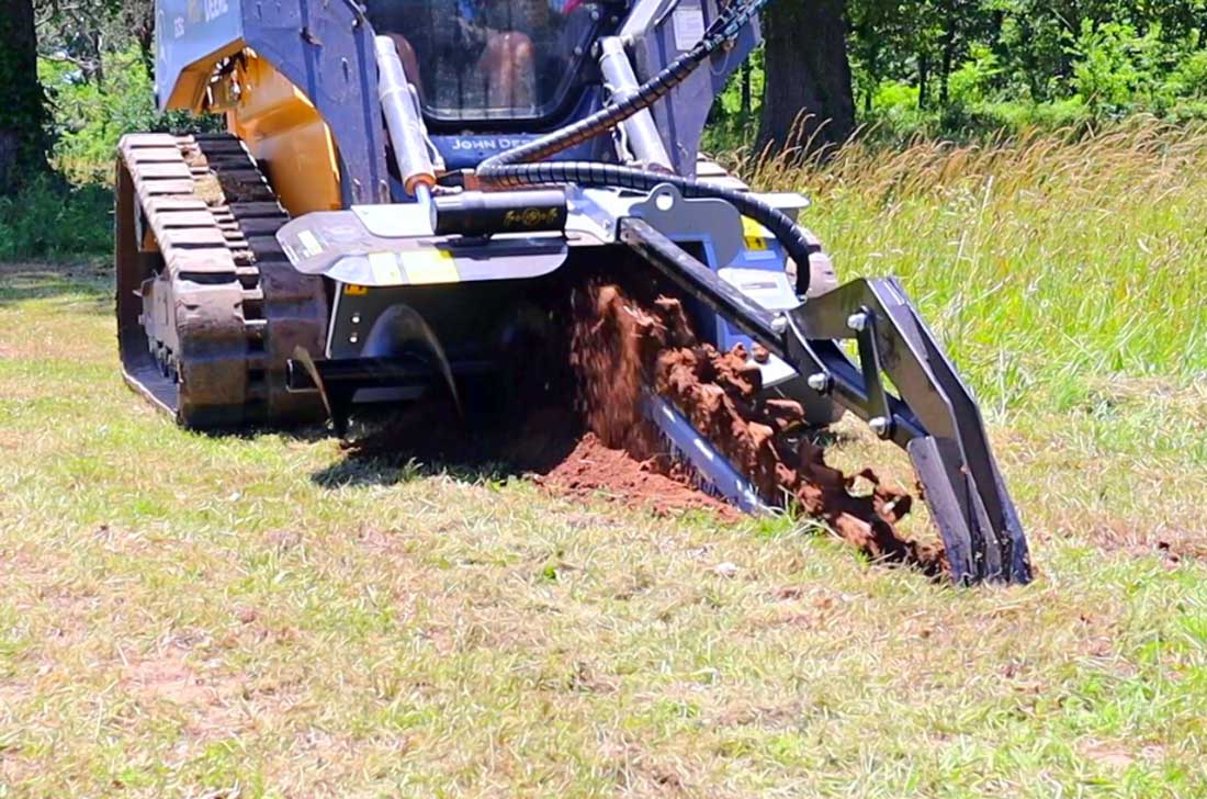 tn548 monté sur une chargeuse compacte John Deere