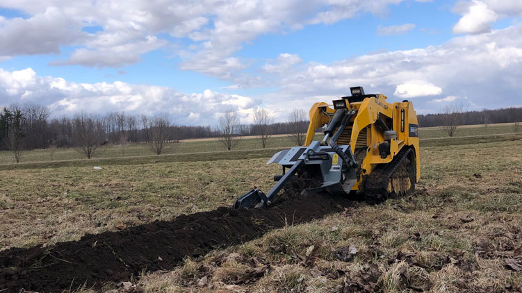 Baumalight TN236 trencher on mini skidsteer