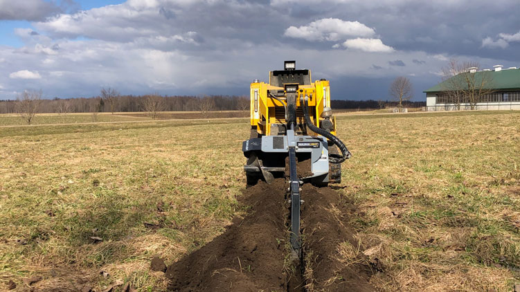 TN236 trencher with side auger