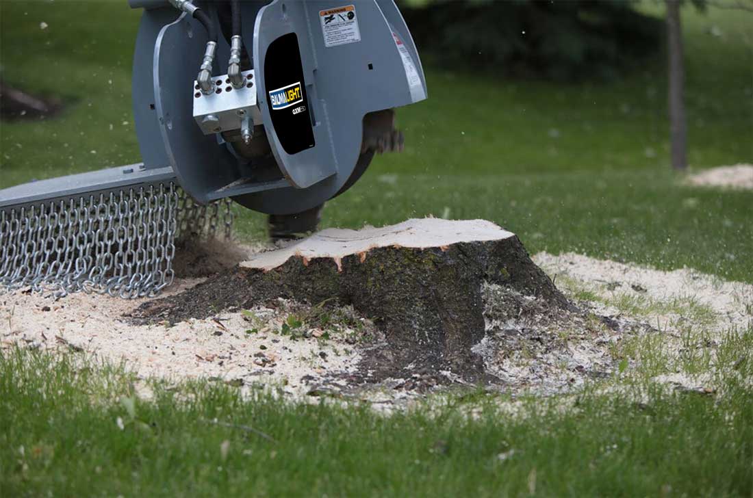 Grinding stumps with excavator