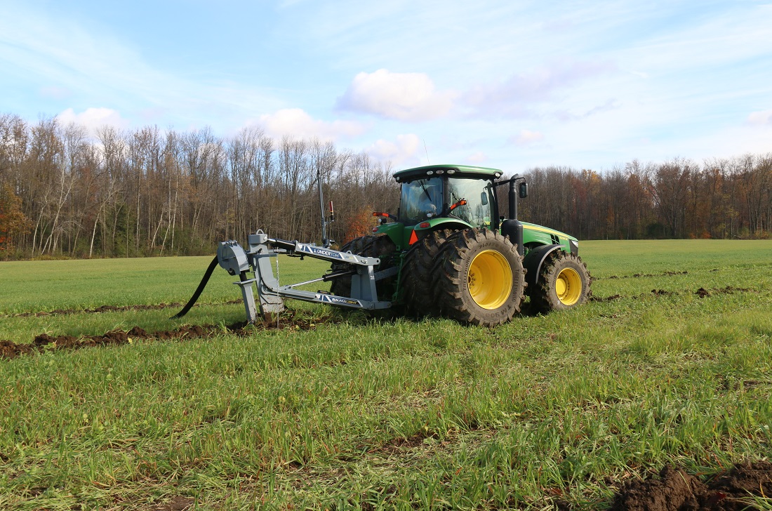 Field drainage with tractor